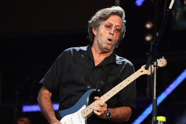 122. Постер: Eric Clapton, играющий на гитаре